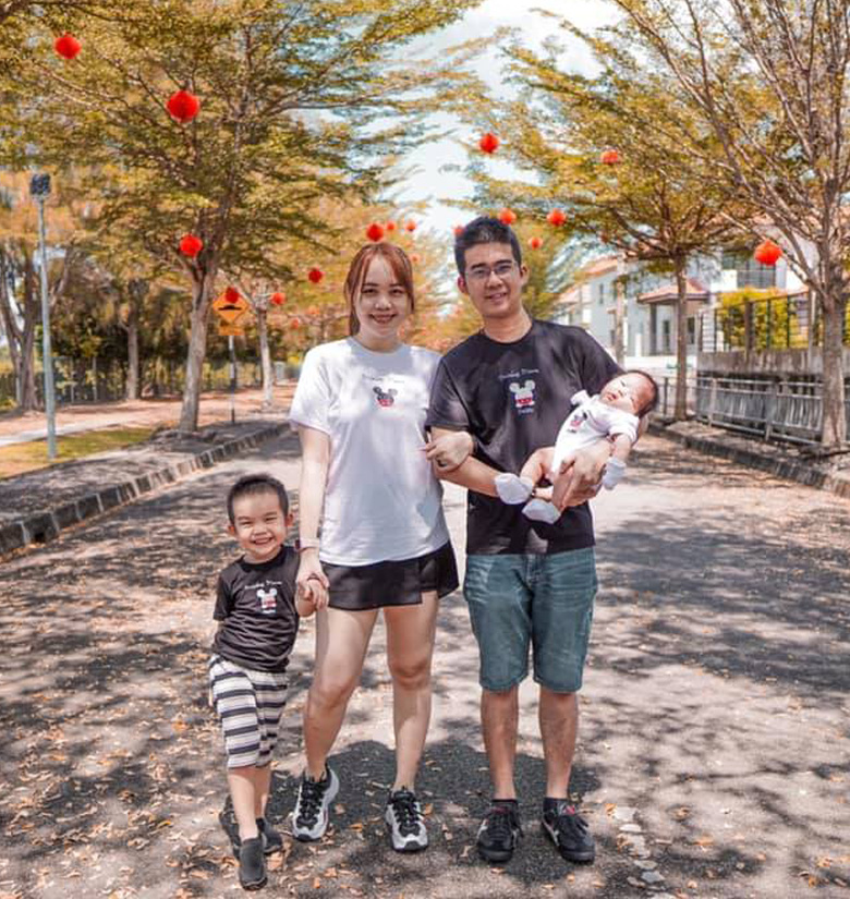 Chris Teng with his wife and their two children